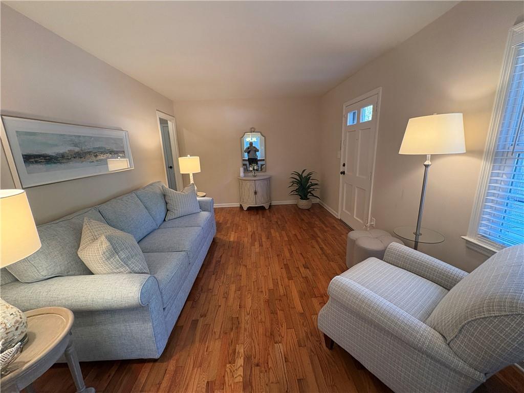 2805 Homeland Drive Atlanta, GA 30360 - Photo 31 of 74 a living room with furniture and a lamp