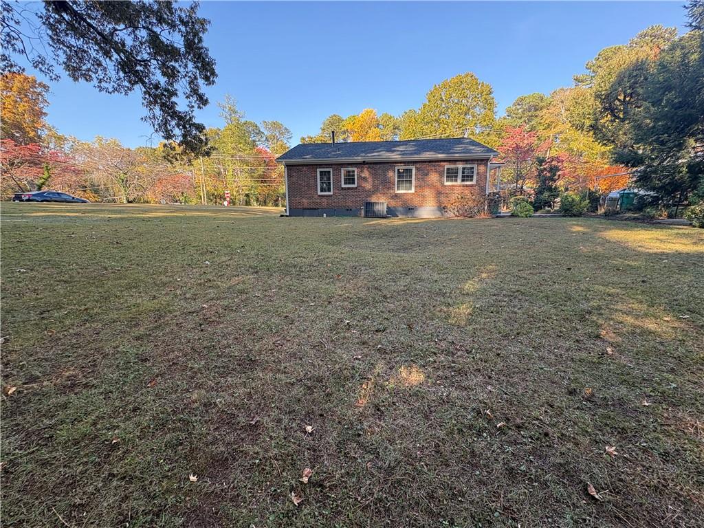 2805 Homeland Drive Atlanta, GA 30360 - Photo 39 of 74 a view of a house with a yard