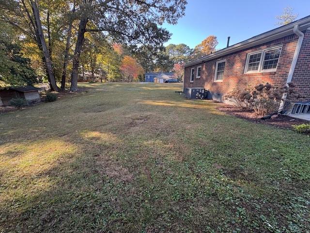 2805 Homeland Drive Atlanta, GA 30360 - Photo 42 of 74 a view of a yard in front of a house with large trees
