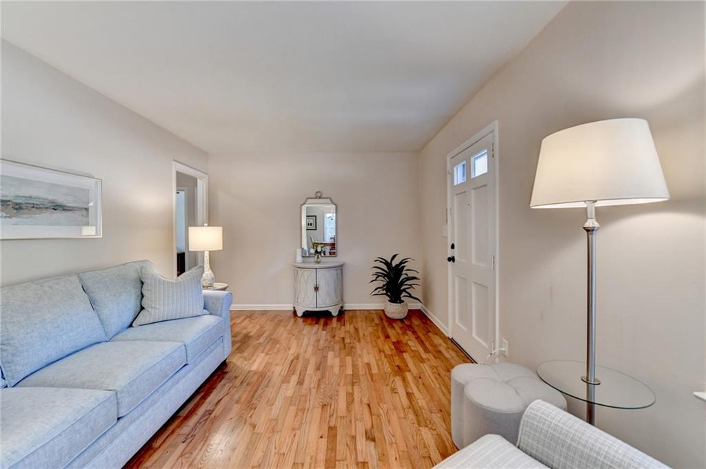 2805 Homeland Drive Atlanta, GA 30360 - Photo 43 of 74 a living room with furniture and a lamp