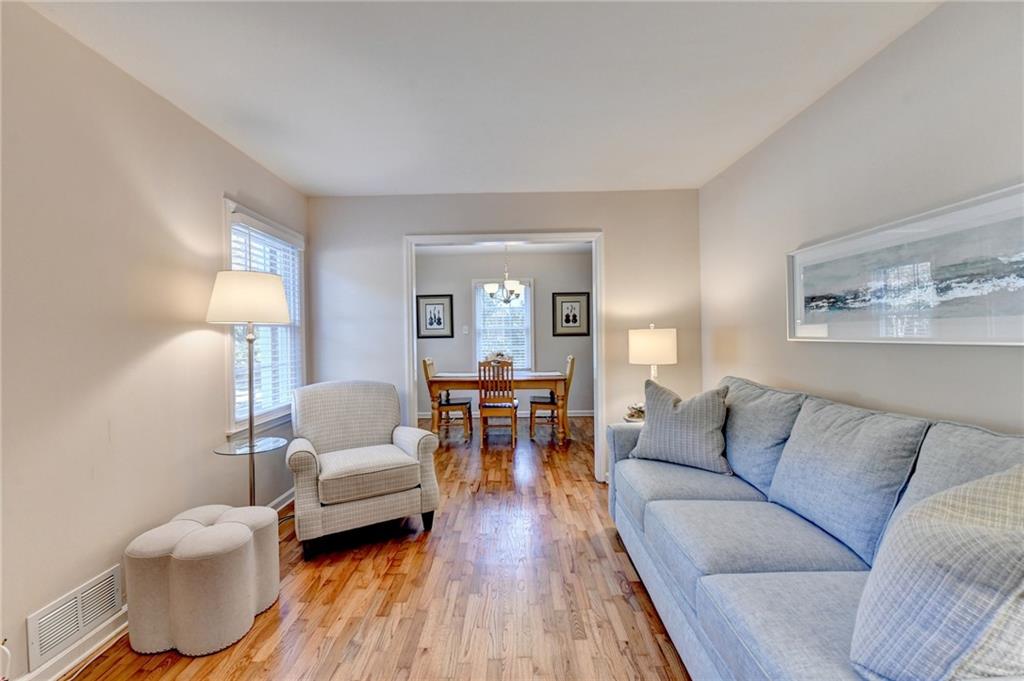 2805 Homeland Drive Atlanta, GA 30360 - Photo 44 of 74 a living room with furniture and wooden floor
