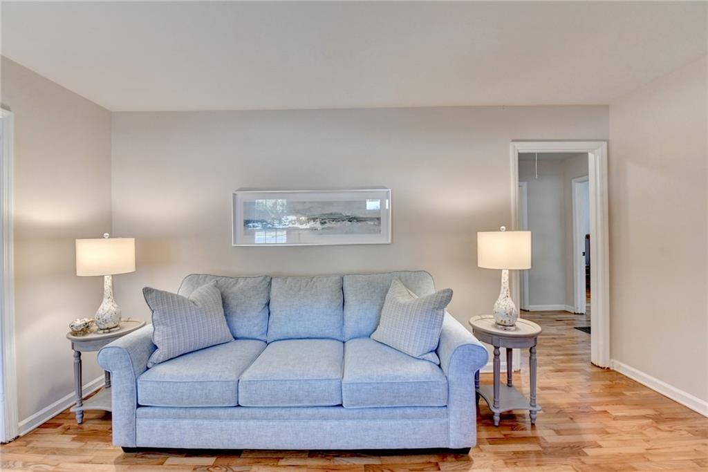 2805 Homeland Drive Atlanta, GA 30360 - Photo 45 of 74 a living room with furniture and a lamp