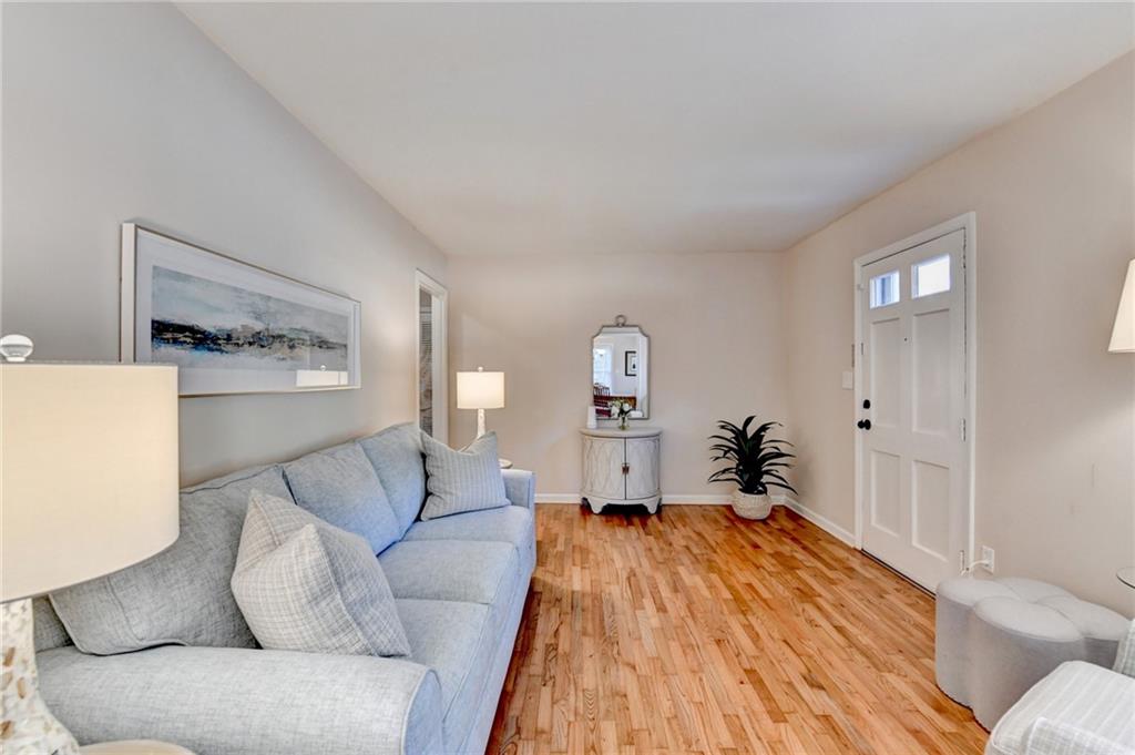 2805 Homeland Drive Atlanta, GA 30360 - Photo 5 of 74 a living room with furniture and a wooden floor