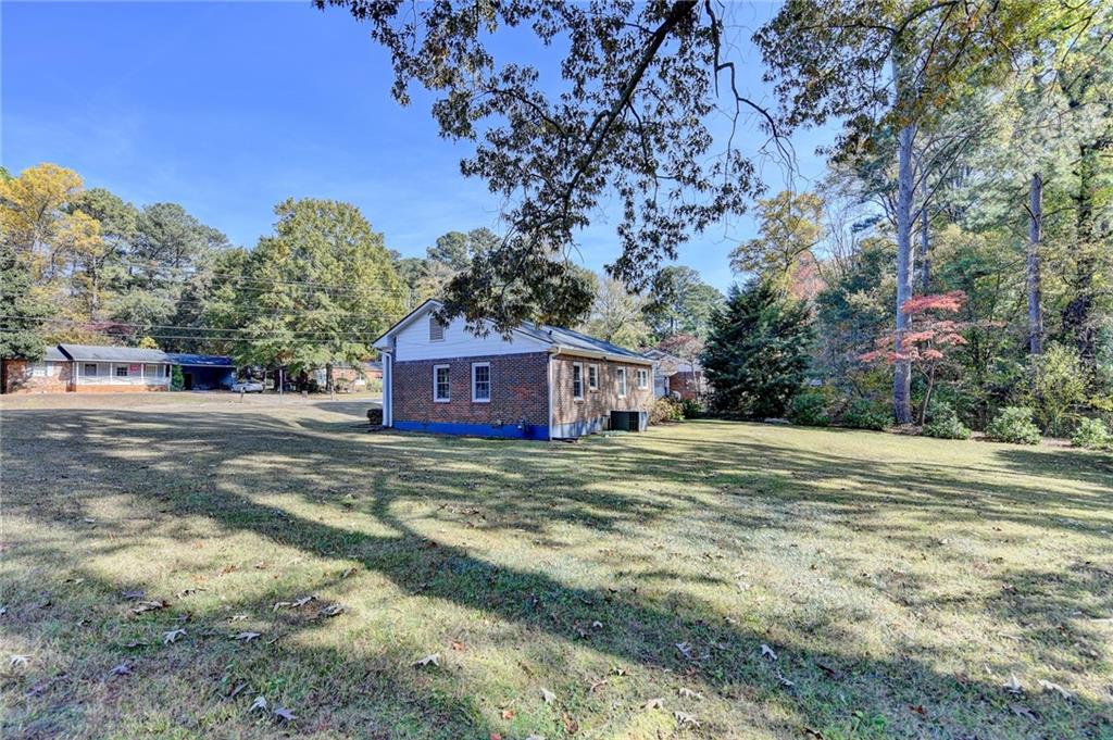 2805 Homeland Drive Atlanta, GA 30360 - Photo 73 of 74 a view of a big yard with large trees