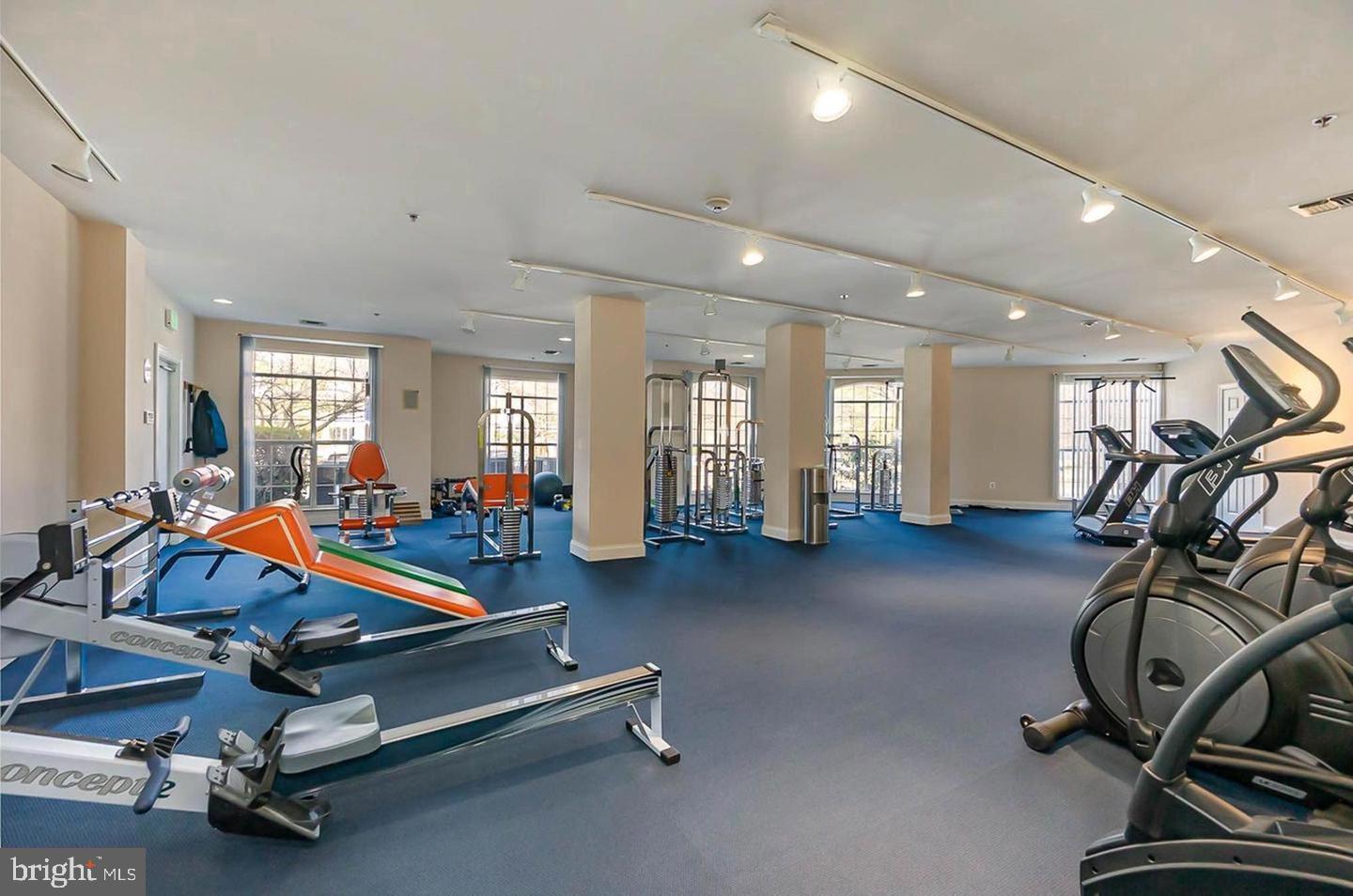 296 Canterbury Road, Unit 296I Bel Air, MD 21014 - Photo 2 of 11 a room with gym equipment and windows