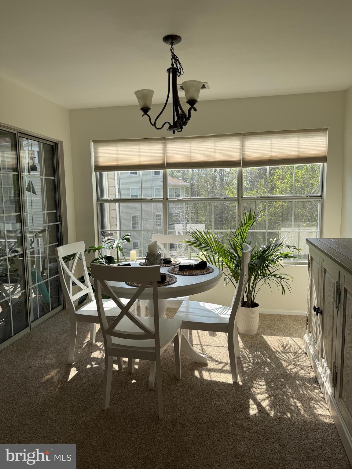 296 Canterbury Road, Unit 296I Bel Air, MD 21014 - Photo 9 of 11 a view of a dining room with furniture window and outside view