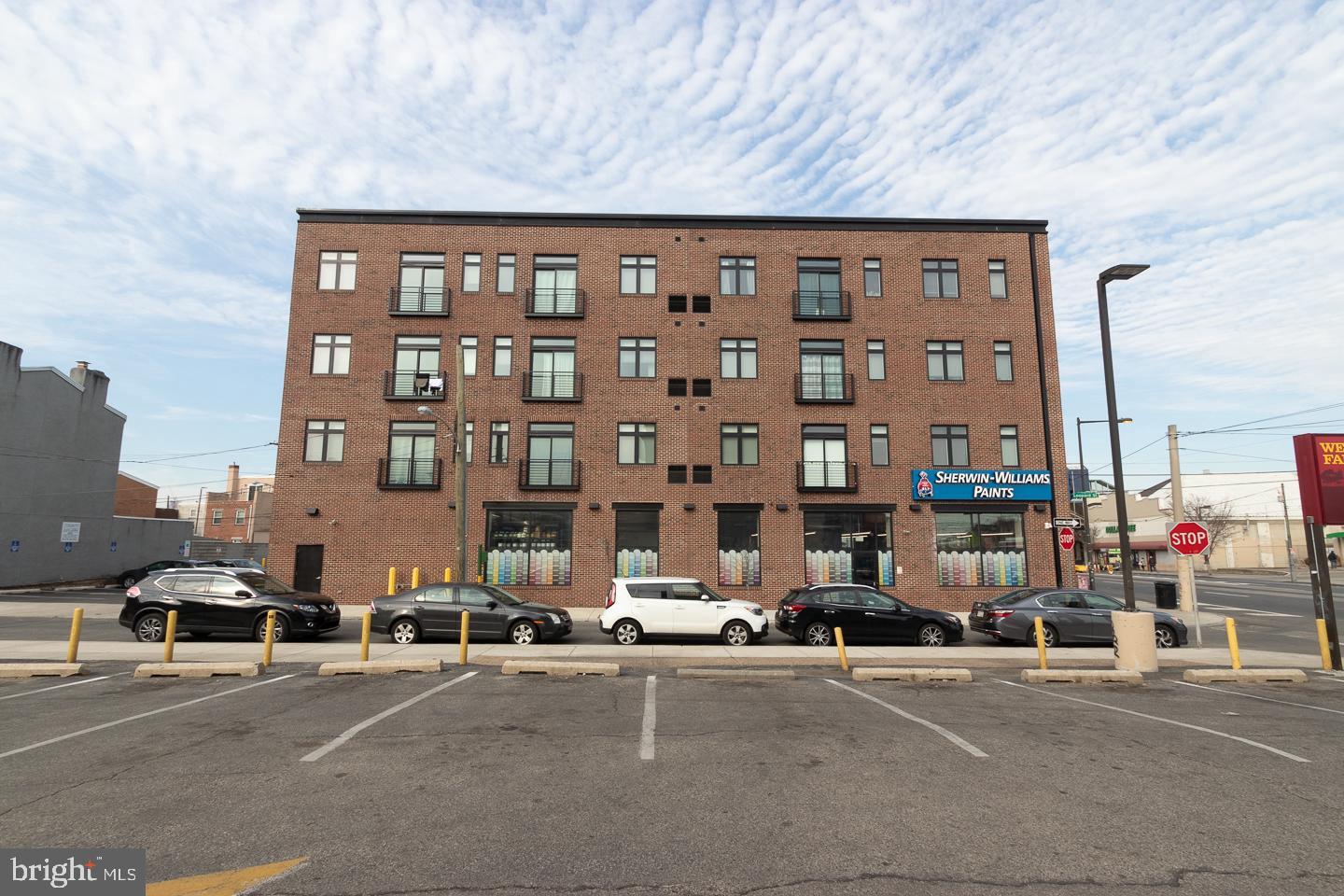 18 West Girard Avenue, Unit 3 Philadelphia, PA 19123 - Photo 16 of 17 a city street lined with parked cars and buildings