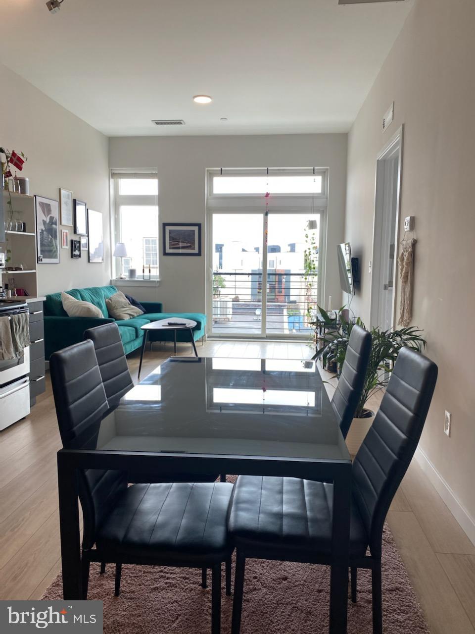 18 West Girard Avenue, Unit 3 Philadelphia, PA 19123 - Photo 2 of 17 a view of a dining room with furniture