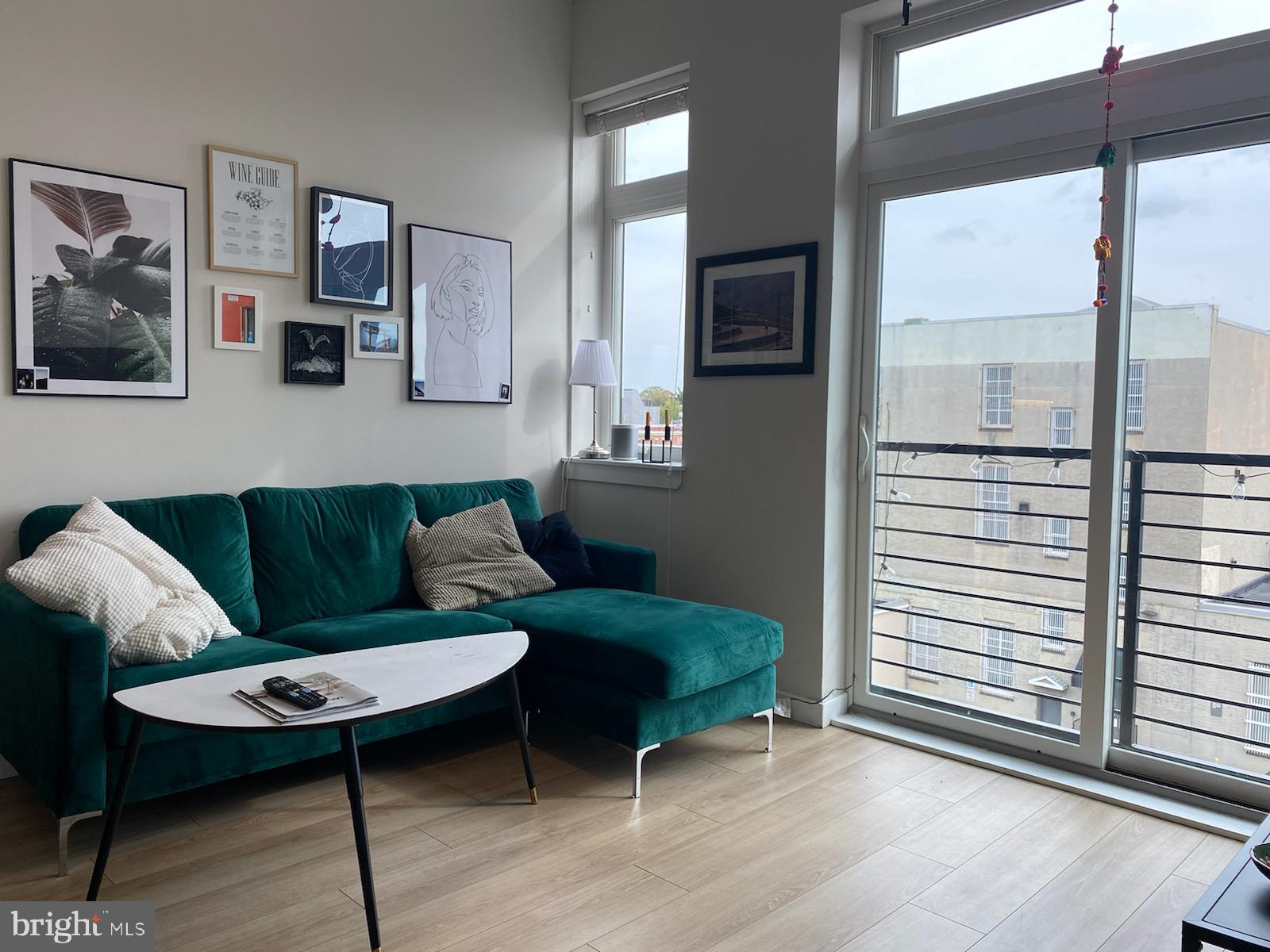 18 West Girard Avenue, Unit 3 Philadelphia, PA 19123 - Photo 3 of 17 a living room with furniture and a window