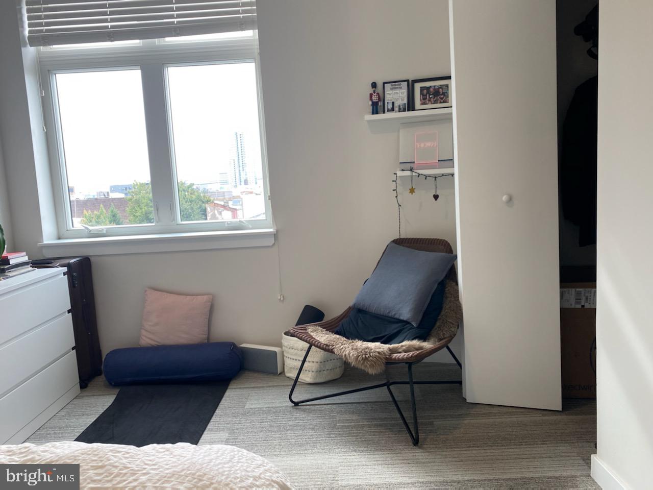 18 West Girard Avenue, Unit 3 Philadelphia, PA 19123 - Photo 10 of 17 a living room with furniture and a window