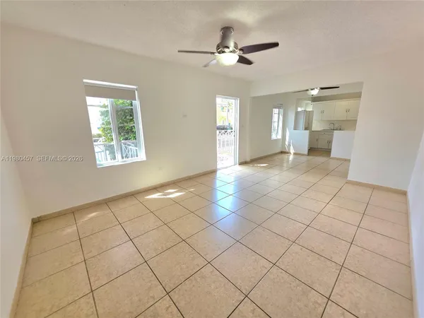 a view of an empty room and window