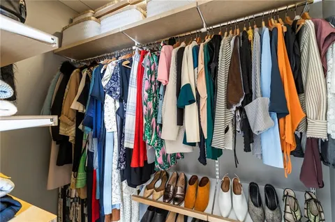 a view of living room with toilet and hallway