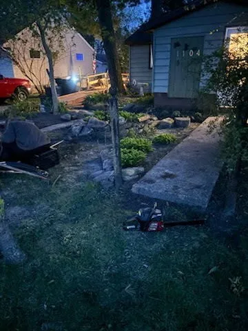 a view of a backyard of the house