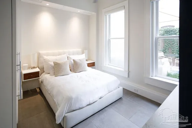 a patio with patio a table and chairs