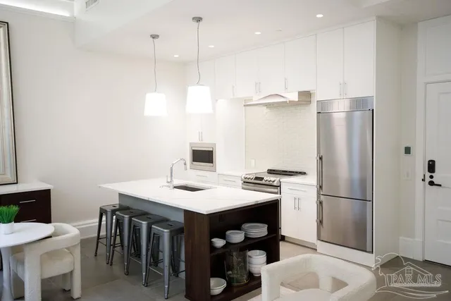 a living room with furniture and a table