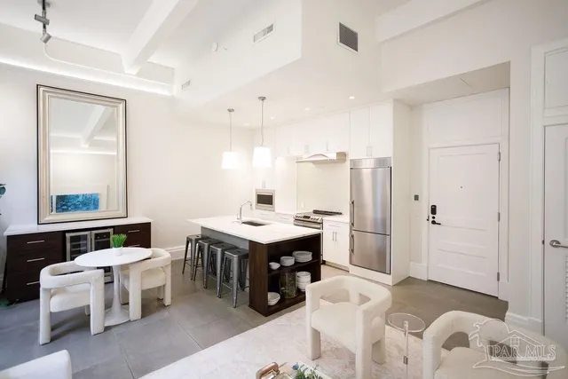 a living room with furniture and a couch