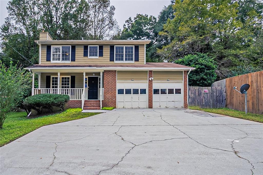 3775 Norman Road Clarkston, GA 30021 - Photo 1 of 1 a house view with a garden space