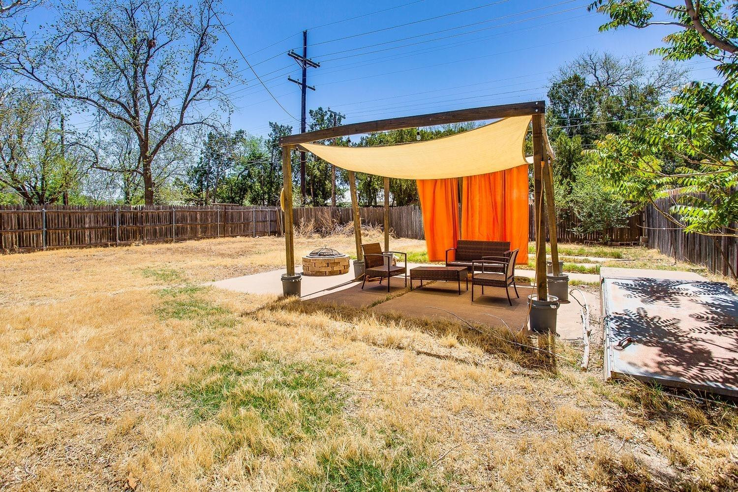 3411 28th Street Lubbock, TX 79410 - Photo 18 of 18 Large Backyard with Storm Cellar