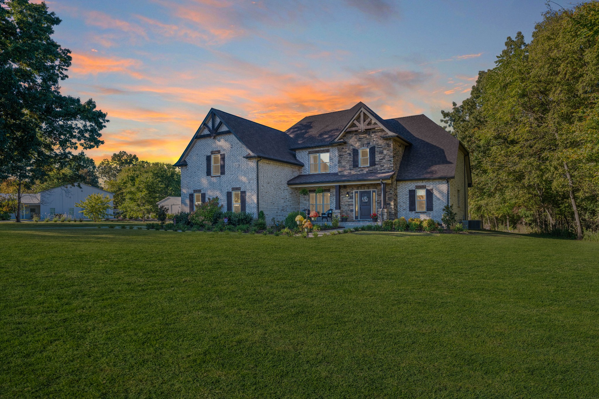 5065 Pickering Road Clarksville, TN 37043 - Photo 1 of 35 a front view of a house with garden