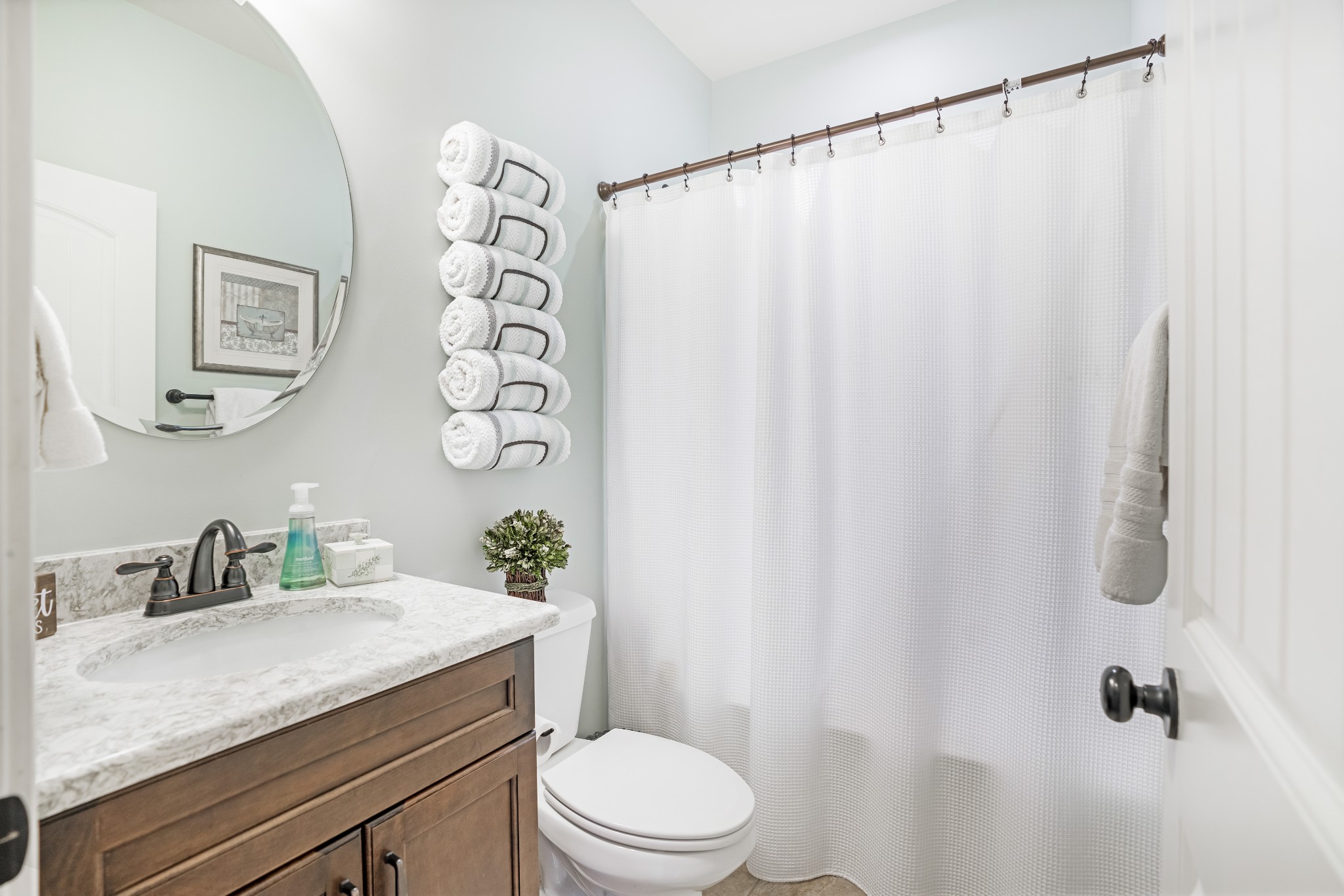 5065 Pickering Road Clarksville, TN 37043 - Photo 20 of 35 a bathroom with a granite countertop sink toilet and shower