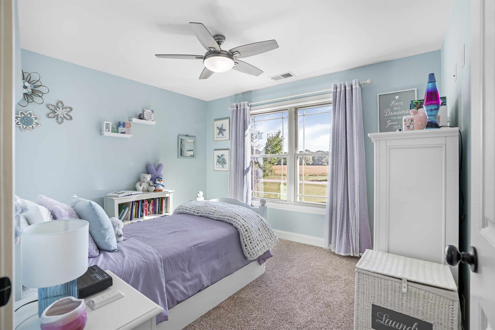5065 Pickering Road Clarksville, TN 37043 - Photo 21 of 35 a bedroom with a bed and a window
