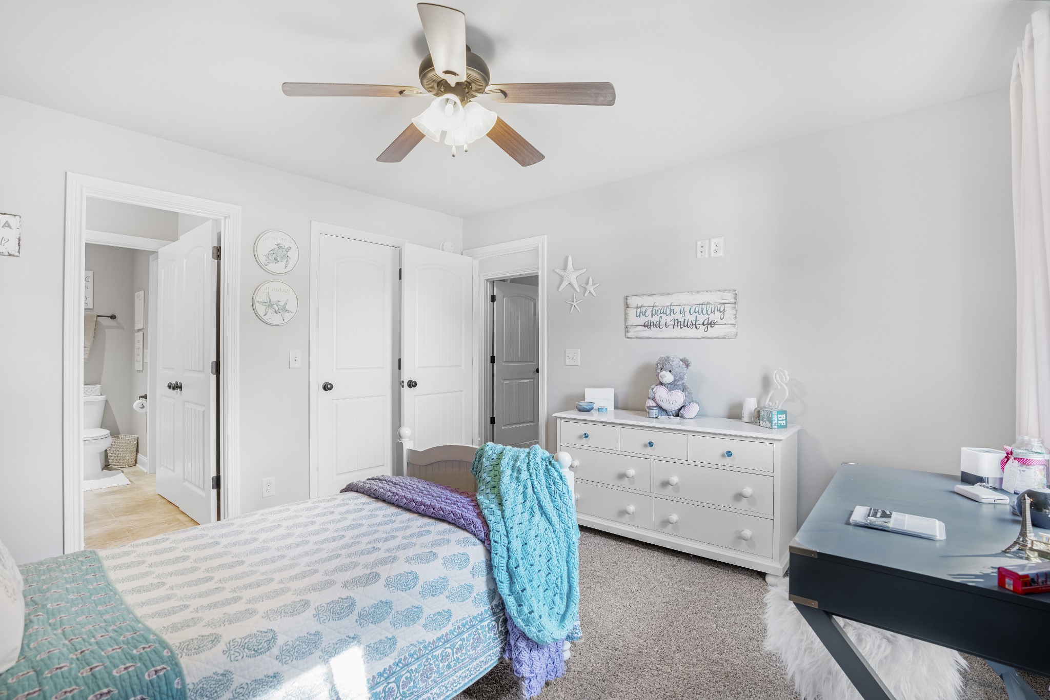 5065 Pickering Road Clarksville, TN 37043 - Photo 24 of 35 a bedroom with a bed and a chandelier