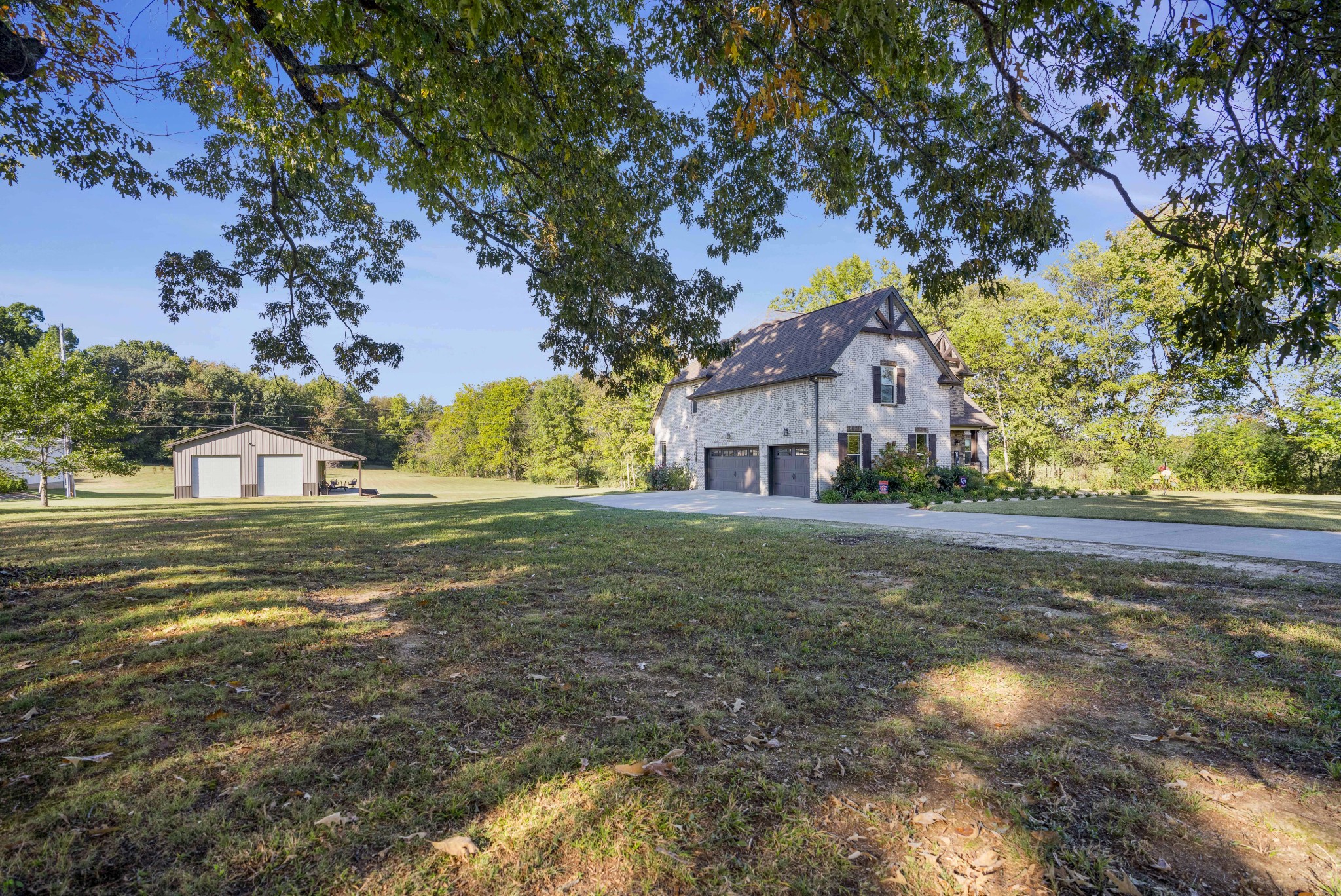 5065 Pickering Road Clarksville, TN 37043 - Photo 30 of 35 a front view of a house with a yard