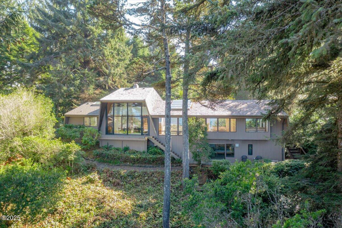 110 Ridge Crest Road Gleneden Beach, OR 97388 - Photo 61 of 72 a front view of a house with a yard