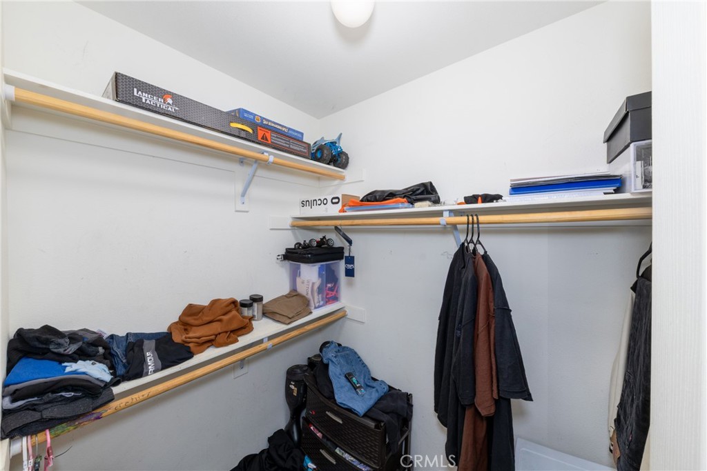 14632 Maricopa Road Victorville, CA 92392 - Photo 16 of 43 a view of a closet with storage