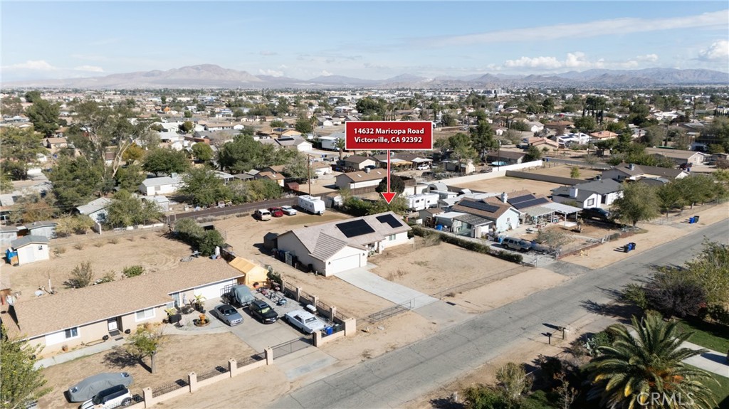 14632 Maricopa Road Victorville, CA 92392 - Photo 33 of 43 an aerial view of residential houses with outdoor space