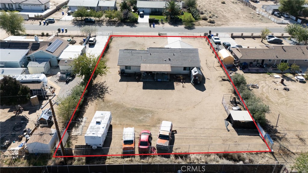 14632 Maricopa Road Victorville, CA 92392 - Photo 40 of 43 an aerial view of multiple houses with outdoor space