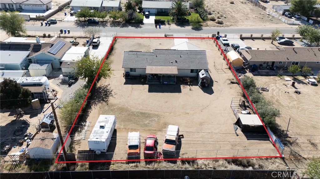14632 Maricopa Road Victorville, CA 92392 - Photo 40 of 43 an aerial view of multiple houses with outdoor space