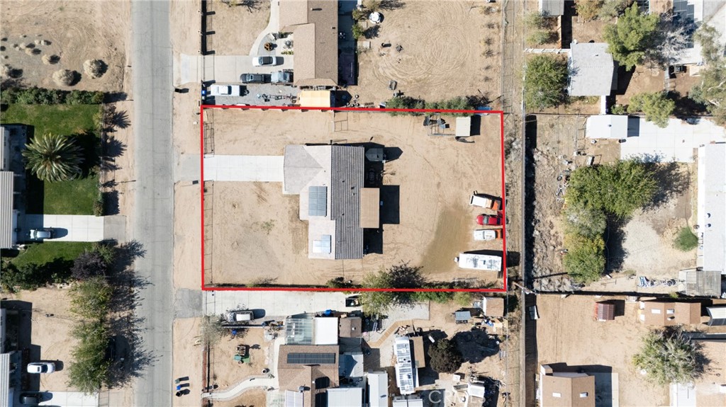 14632 Maricopa Road Victorville, CA 92392 - Photo 42 of 43 an aerial view of residential houses with outdoor space