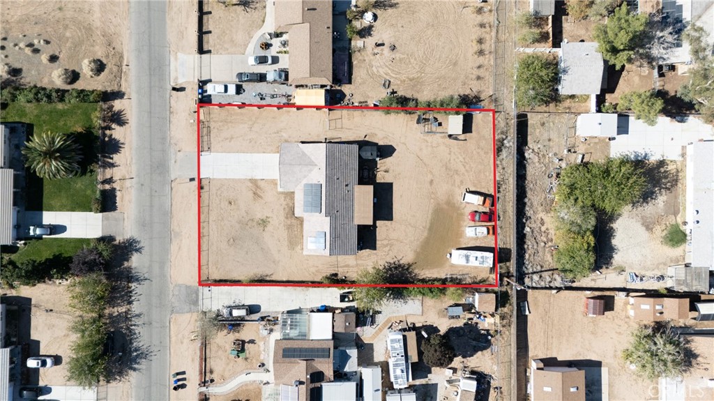 14632 Maricopa Road Victorville, CA 92392 - Photo 42 of 43 an aerial view of residential houses with outdoor space