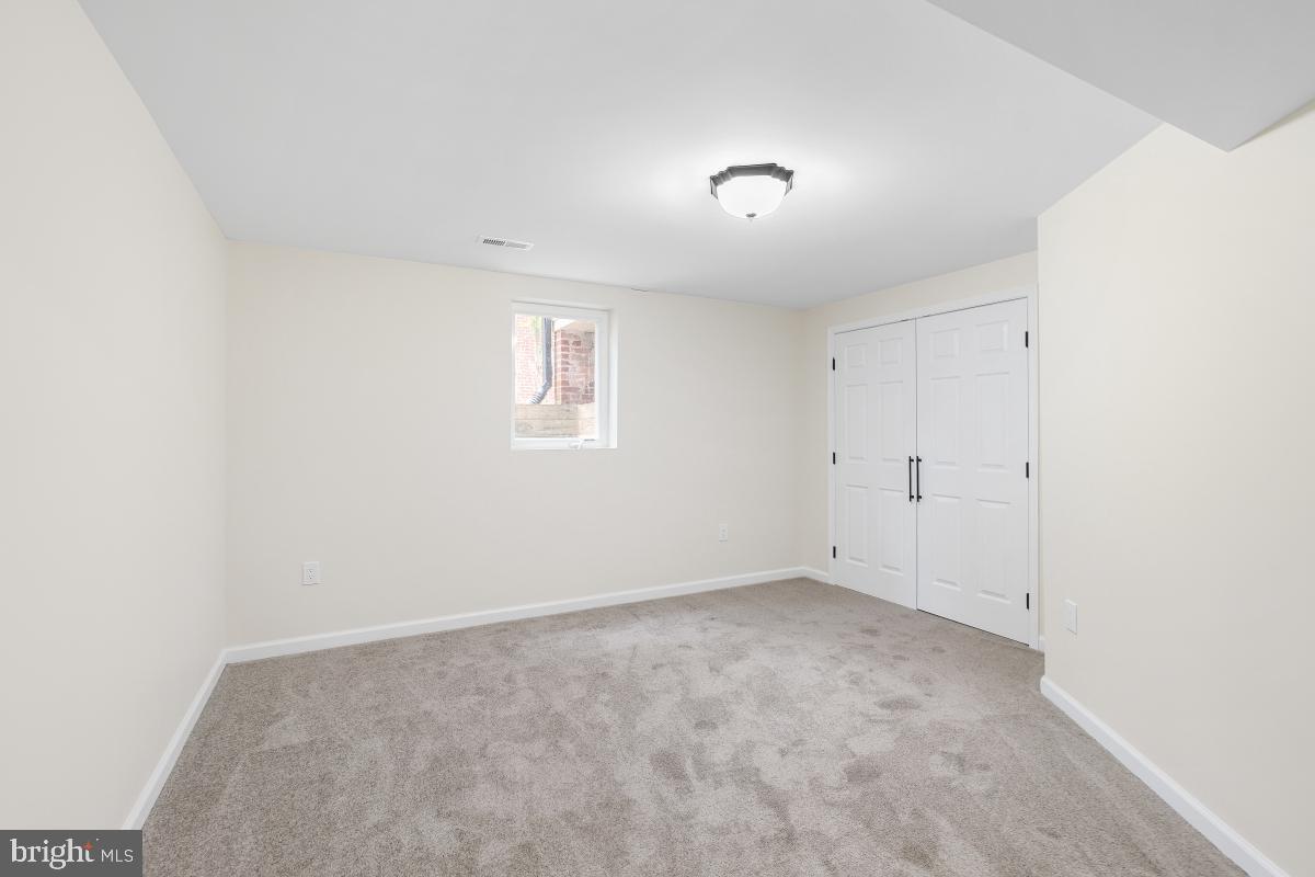 1203 Brantford Avenue Silver Spring, MD 20904 - Photo 24 of 32 an empty room with a windows
