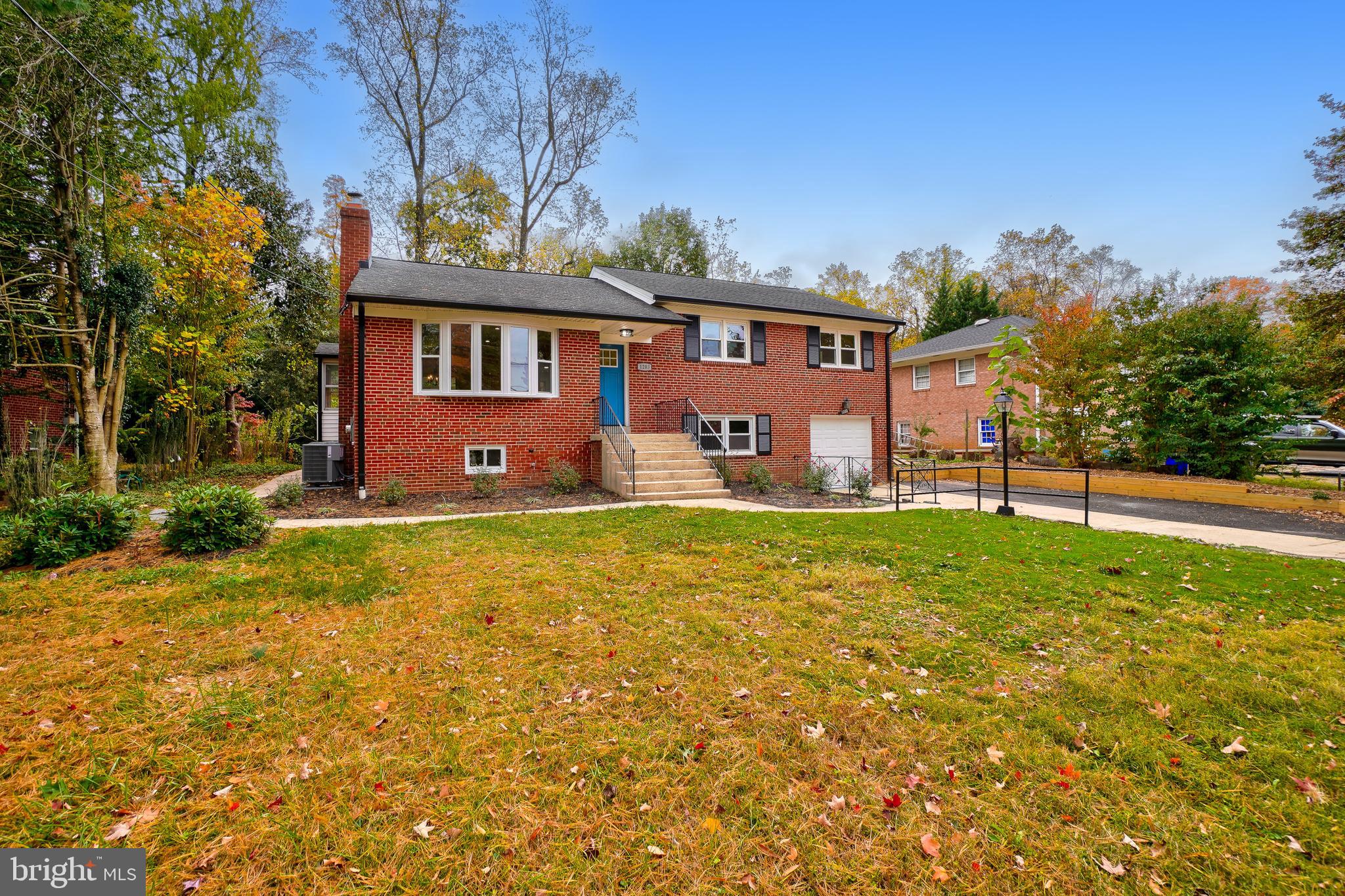 1203 Brantford Avenue Silver Spring, MD 20904 - Photo 31 of 32 a front view of a house with a yard
