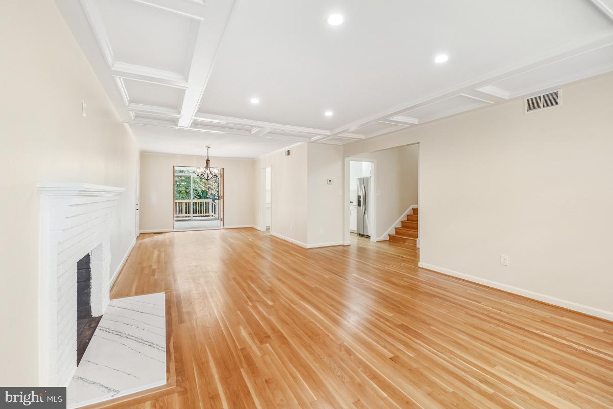 1203 Brantford Avenue Silver Spring, MD 20904 - Photo 5 of 32 a view of empty room with wooden floor and fan