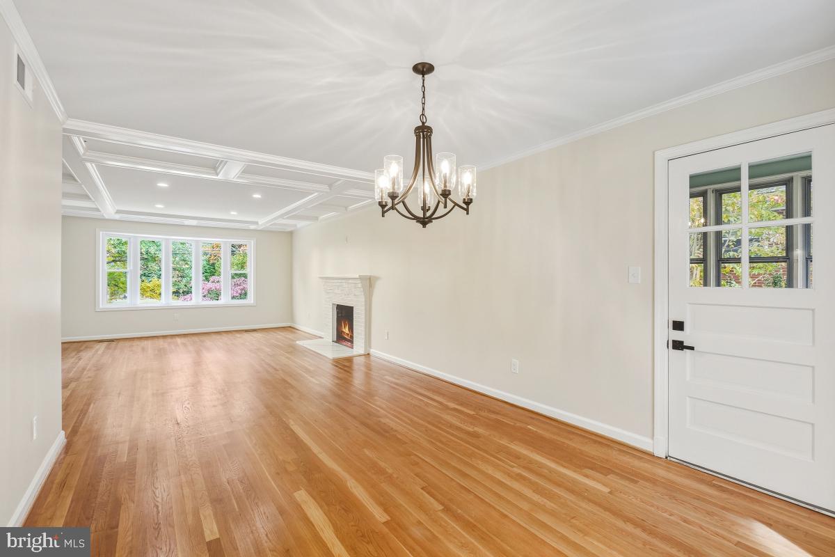 1203 Brantford Avenue Silver Spring, MD 20904 - Photo 6 of 32 a view of empty room with wooden floor and fan