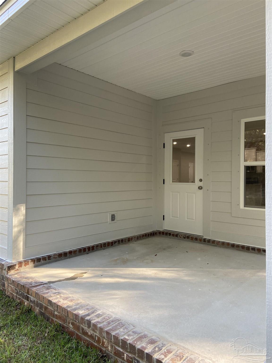 6768 Contentment Street Milton, FL 32583 - Photo 19 of 21 a view of a garage