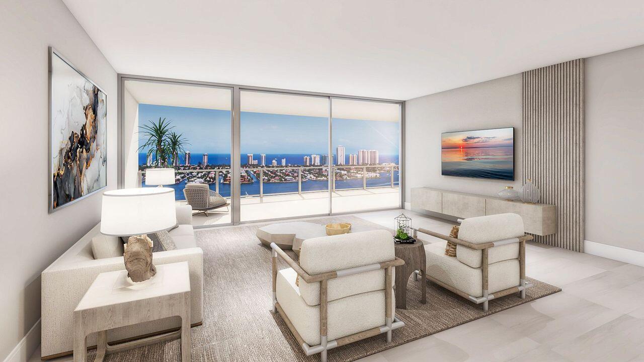 220 Lake Shore Drive, Unit 1910 Lake Park, FL 33403 - Photo 5 of 45 a living room with furniture and a flat screen tv