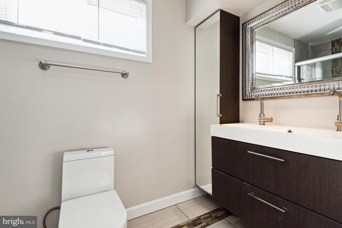 14016 Adkins Road Laurel, MD 20708 - Photo 20 of 54 Master Bath with double sink and storage
