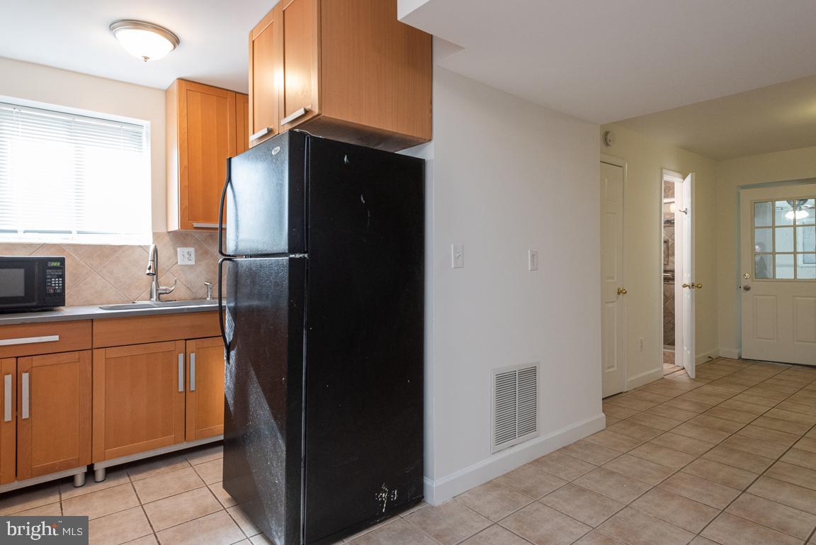 14016 Adkins Road Laurel, MD 20708 - Photo 31 of 54 Fridge in a 6x6 ft space