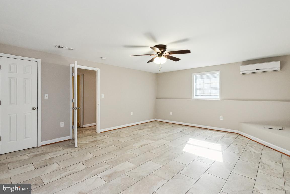14016 Adkins Road Laurel, MD 20708 - Photo 41 of 54 Measures 17x19 with tile flooring and wall unit
