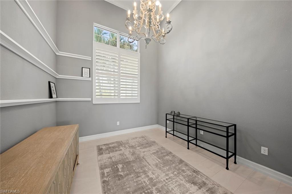 14792 Spinnaker Way Naples, FL 34114 - Photo 14 of 48 a view of a livingroom with a window