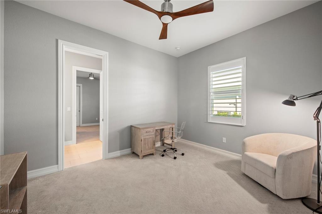 14792 Spinnaker Way Naples, FL 34114 - Photo 27 of 48 a bedroom with a bed and window