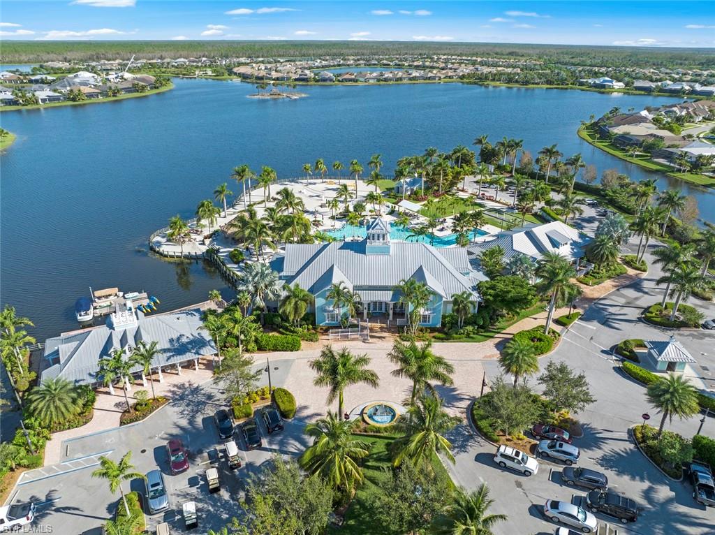 14792 Spinnaker Way Naples, FL 34114 - Photo 37 of 48 an aerial view of a house with a lake view