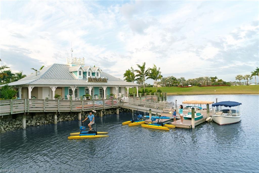 14792 Spinnaker Way Naples, FL 34114 - Photo 46 of 48 a aerial view of a house with swimming pool and furniture