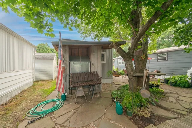 a house view with a backyard space