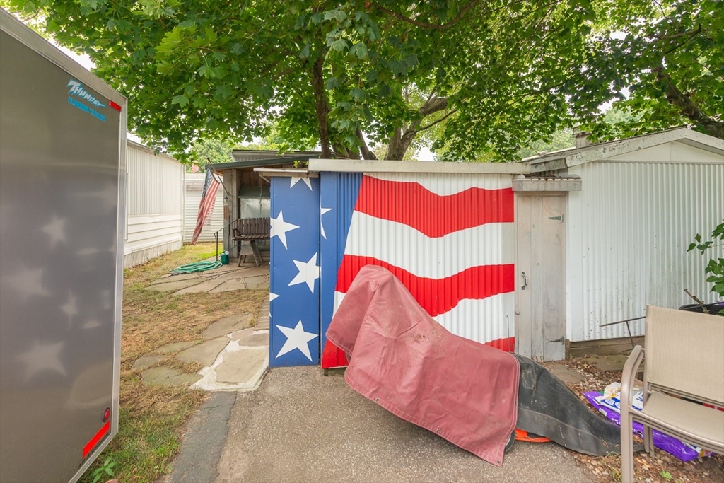 239 Ayer Road, Unit 16 Littleton, MA 01460 - Photo 21 of 22 with view of outdoor space and barbecue grill