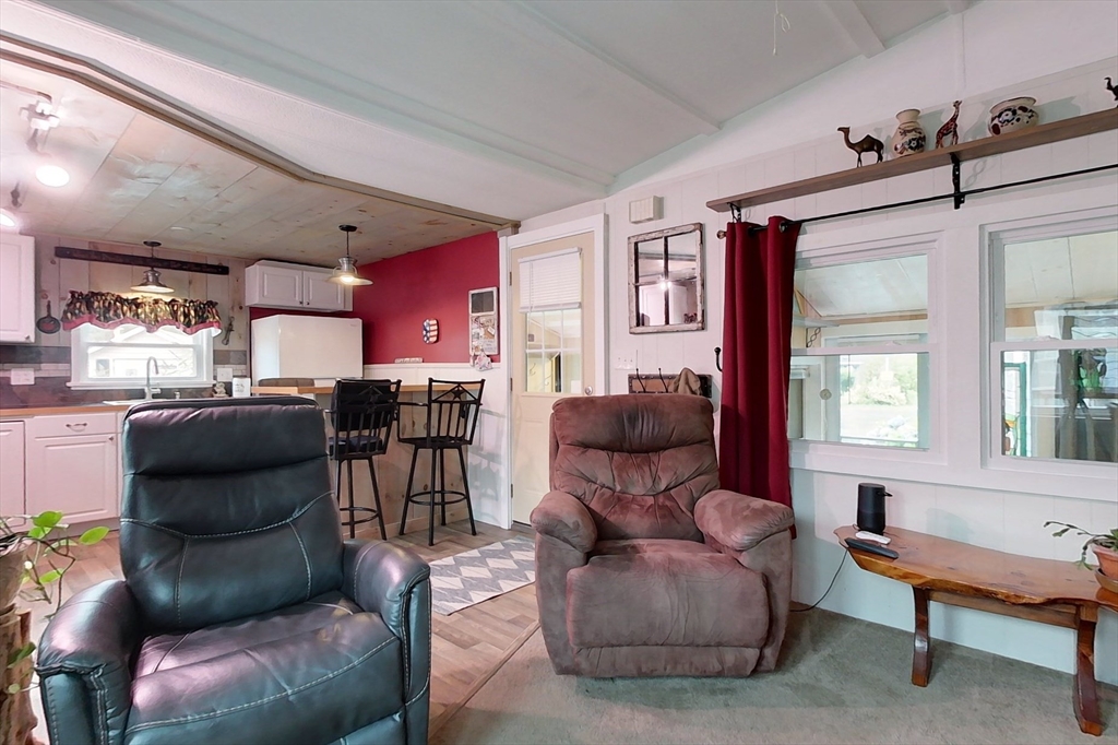 239 Ayer Road, Unit 16 Littleton, MA 01460 - Photo 7 of 22 a living room with furniture and a window